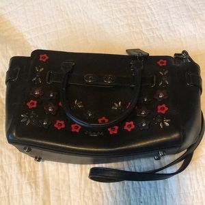 Used coach handbag; black with red floral details